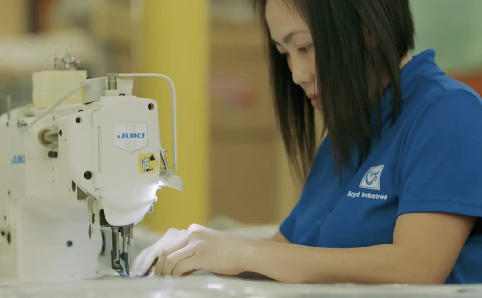 Boyd Industries — upholstery being sewn by hand on the factory floor in Florida