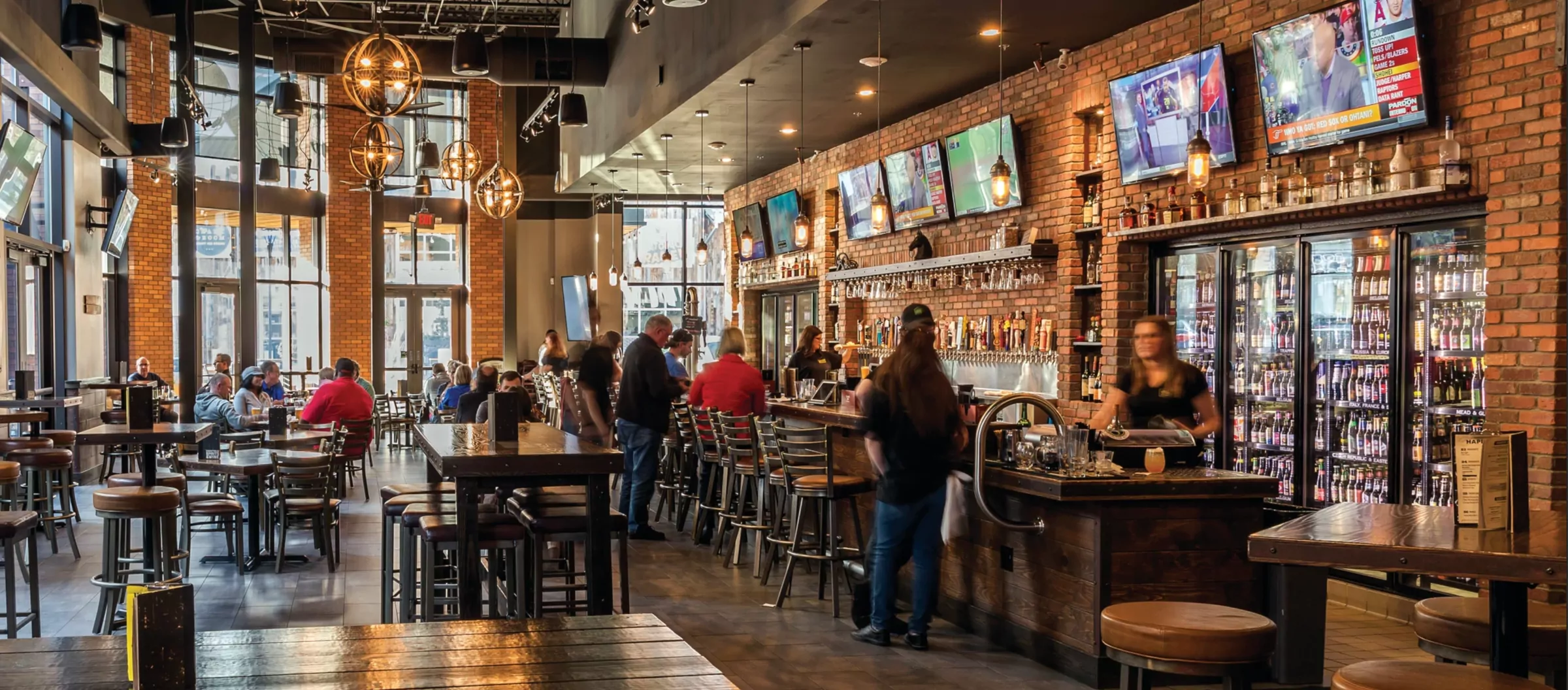 World of Beer — the bar, with the brand applied across taps, signage and glassware